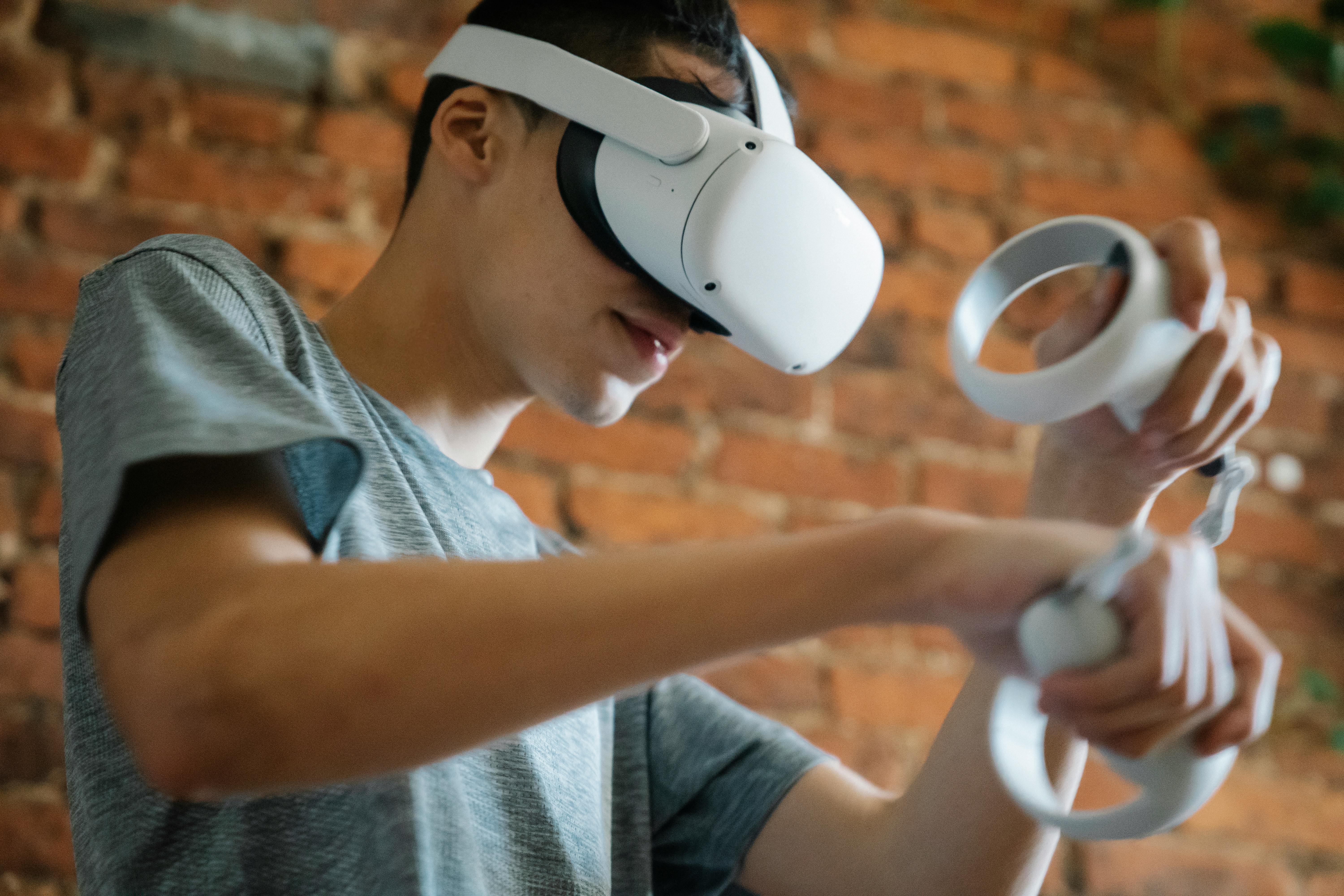 A person wearing a VR headset and playing a VR game.